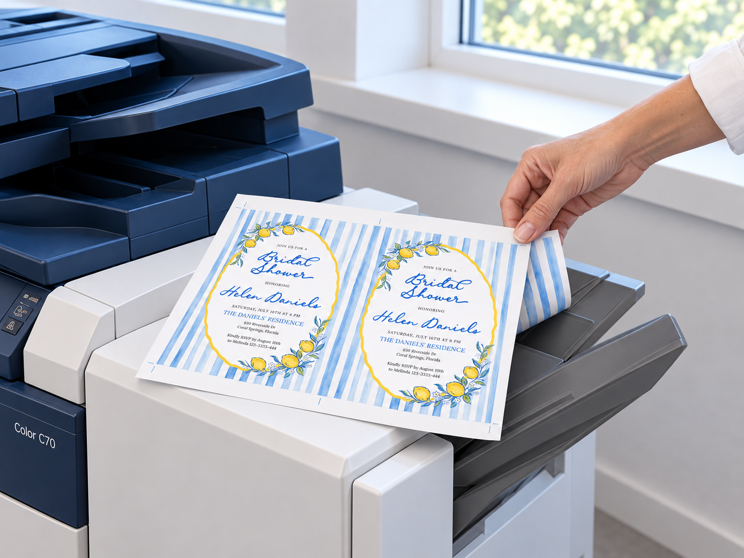 Illustration of the two-invitation sheet at a printer